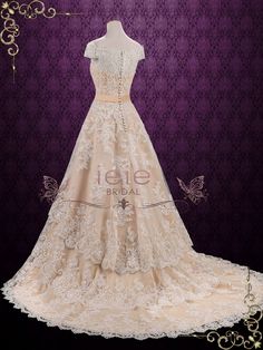 a wedding dress on display in front of a purple background