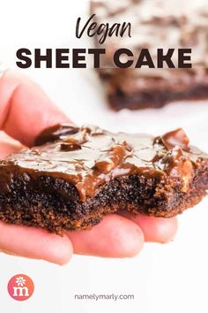 vegan sheet cake in someones hand with chocolate frosting on top and the words vegan sheet cake above it