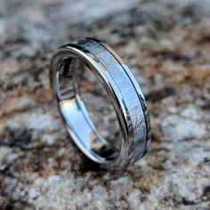 These rings are truly out of this world. We have searched the globe for authentic Gibeon meteorite to make these one-of-a-kind wedding bands. This particular ring is made with genuine Gibeon meteorite and cobalt chrome. All of our rings include a deluxe comfort fit and lifetime warranty. As shown, the Gibeon meteorite on this ring has been hand formed and acid etched by a highly trained artisan which really makes the Widmanstatten pattern stand out and the edges and contour flow smoothly. Manufa Meteorite Wedding Ring, Meteorite Wedding Rings, Meteorite Rings, Meteorite Wedding Band, Gibeon Meteorite, Meteorite Ring, Men's Wedding Ring, Wide Rings, Ring Crafts