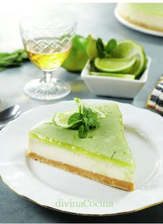 a slice of lime cheesecake on a white plate