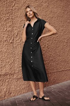 The Black Collared Front Button Midi Dress features a sleek collar and a streamlined midi length for a look that's effortlessly sophisticated. Product code: CAA05B4F004AA Features:  Woven Collared neckline Cap sleeves Front buttons  Maxi Wash Method: Regular Wash Material: 70%RAYON,30%POLYESTER. Classic V-neck Midi Dress With Buttons, Classic V-neck Shirt Dress With Button Closure, Fitted Knee-length Solid Color Shirt Dress, Fitted Knee-length Shirt Dress, Fitted Knee-length Shirt Dress In Solid Color, Sleek Midi Dress For Date Night, Solid Color Short Sleeve Midi Dress With Button Closure, Solid Short Sleeve Midi Dress With Button Closure, Solid V-neck Midi Dress With Button Closure