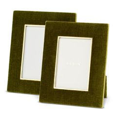 two green and white frames sitting next to each other