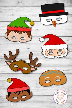 paper masks with santa claus, reindeer and snowman on wooden planked background for christmas party decorations