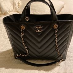 Black. Never Been Used. Comes With Tags Chanel Shopper Bag, Designer Black Bags For Office, Designer Black Office Bags, Designer Black Shoulder Bag For Office, Designer Black Office Shoulder Bag, Luxury Black Shopping Bag, Luxury Black Tote Shoulder Bag, Luxury Black Shoulder Bag For Shopping, Luxe Black Shoulder Bag For Everyday Use