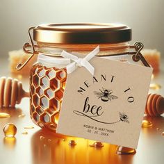 a honey jar with a label that says we are bee on it and some honeycombs around it