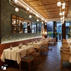 an empty restaurant with tables and chairs