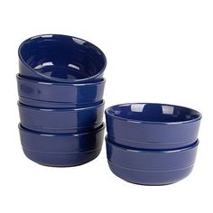 four blue bowls stacked on top of each other