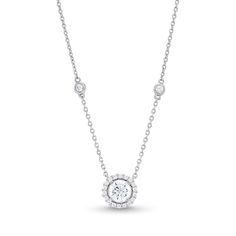 Wear sparkle in a sophisticated way with this diamond frame station necklace. 14K white gold The 1/2 ct. round center diamond glistens in a diamond halo Bezel-set diamond stations dot the chain for added shimmer 3/4 ct. t.w. of diamonds 18.0-inch cable chain necklace with lobster claw clasp Diamond Halo Necklace, Classic Halo Diamond Necklace In Cubic Zirconia, Classic Cubic Zirconia Diamond Necklace With Halo, Classic Cubic Zirconia Halo Diamond Necklace, Classic Cubic Zirconia Diamond Necklace, Classic Diamond Necklace With Halo Detail, Classic Diamond White Necklace With Halo Design, Classic Diamond White Halo Necklace, Formal Solitaire Necklace With Halo Round Cut