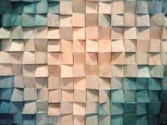 an abstract painting made out of wood blocks