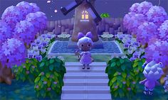 an animal crossing a path in the middle of flowers and trees with a windmill in the background