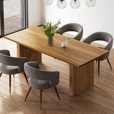 a wooden table surrounded by grey chairs