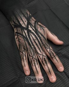 a person's hand with black ink on it