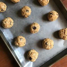 twelve cookies on a baking sheet ready to go into the oven or bake in the oven