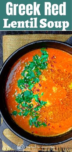 greek red lentil soup in a cast iron skillet with parsley on top