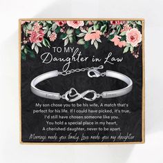 an image of a daughter's bracelet with the poem to my daughter in law