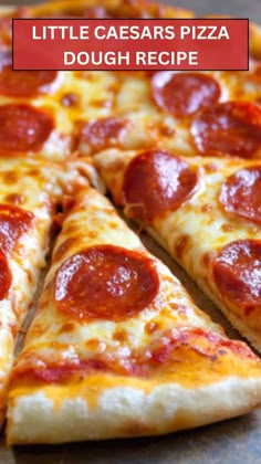 a pepperoni pizza cut into slices with the words little caesars pizza dough recipe