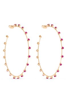 Colorful crystals spark shine over slim hoop earrings plated in 18-karat gold. 2 1/2" hoop diameter Post back 18k-gold plate/glass Imported Crystal Hoop Earrings, Fuchsia Color, Huggie Hoop Earrings, Fabric Gift Bags, Gold Drop Earrings, Keep Jewelry, Jewelry Plate, Print Gifts, Crystal Jewelry