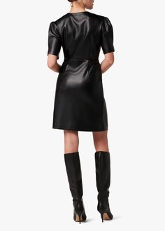 Unleash your inner style with the Millie Twisted Vegan Leather Dress. Crafted from our supple vegan leather in Black, this mini is truly a do-it-all dress, complete with puff sleeves and twist front detailing.100% PolyurethaneMODEL IS WEARING SIZE SMALL Cat Dresses, Size Chart For Kids, Savile Row, Womens Size Chart, Leather Dress, Twist Front, Halloween Women, Colored Denim, Newborn Girl