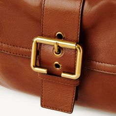 Introducing our Camera Medium Bag, crafted from luxurious shiny buffalo leather. Adorned with revamped buckles from our iconic Paddington bag, this bag exudes sophistication. With multiple pockets, it offers versatility - carry it by hand, shoulder, or cross-body with the handles or strap. Elevate your style with this exclusive piece. Chloe Brown, Leather Camera Bag, Medium Bag, Elegant Bags, Best Wallet, Backpack Travel Bag, Buffalo Leather, Chloe Bag, Brown Bags