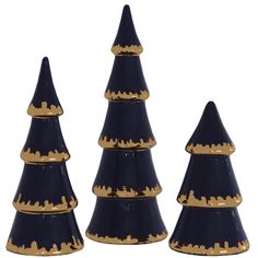 three black and gold ceramic christmas trees