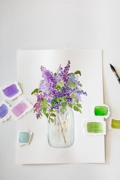 a watercolor painting of purple flowers in a mason jar with green and purple dyes