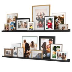 two black shelves filled with pictures and framed photos next to each other in front of a white background