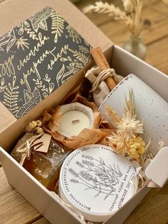 a box filled with candles and other items