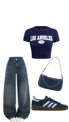 a pair of blue jeans and a t - shirt with the word los angeles on it