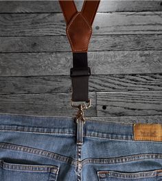 Our USA-made by 3D. Leather suspenders are the perfectly stylish accessory for your wardrobe. The main leather straps are 1 3/8" and taper to 3/4". Buckle adjustment and elastic back and scissor style clips for easy attachment to pants. Stocked in our Smyrna, TN store 20 miles from Nashville. Measure approximately 36" - 44" for Large Measure approximately 41" - 51" for X-LargeAdjustableSuspenders are measured from back center belt loop, over the shoulder to front belt loop Classic Fitted Leather Belts And Suspenders, Casual Leather Belts And Suspenders, Fitted Leather Belts And Suspenders, Luxury Leather Belts And Suspenders, Classic Style, Black Leather Belts And Suspenders With Adjustable Strap, Leather Suspenders, Suspenders, Stylish Accessories, Leather Straps