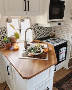 the kitchen counter is clean and ready to be used for cooking or eating, as well as some other things