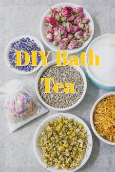 four bowls filled with different types of flowers and herbs next to the words diy bath tea