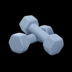 two blue dumbbells sitting on top of each other