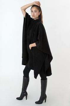 This Unisex Poncho is made of our insulating, cozy Polar Fleece and features a front kangaroo-style pocket and half zip neckline with an adjustable drawcord at the neck to ensure extra warmth. Layer with a turtleneck and our winter leggings for a simple and functional winter look. Also the perfect piece to wear around the house when its too cold to even leave. Made in South Central, Los Angeles by experienced workers earning fair wages. | Polar Fleece Half Zip Poncho for Women in Bordeaux Cozy Long-sleeve Winter Cape, Poncho For Women, Winter Leggings, Poncho Style, South Central, Black Fleece, Polar Fleece, Winter Looks, Ponchos