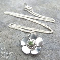 Peridot Buttercup Sterling Silver Flower Pendant | New design for 2015 - decorative tube setting Tube Setting, Silversmithing Jewelry, Modern Silver Jewelry, Bezel Jewelry, Jewelry Photography Styling, Handmade Silver Jewellery, Sunflower Jewelry, Metalsmithing Jewelry, Flower Handmade