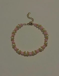 Handmade cutesy pearl and pink beaded bracelet.    The size of the bracelet (6in or 8in) is measured by the beaded part. All bracelets have an additional 2 inch gold plated chain. The bracelet clasp and chain is gold plated so it will not rust in contact with water. It is handmade so flaws may be a little visible. Beaded Bracelet Aesthetic, Pink Beaded Bracelet, Bracelet Aesthetic, Pink Beaded Bracelets, Cute Bracelet, Bracelet Pearl, Jewelry Summer, Pearl Pink, Pink Beaded