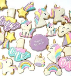 decorated cookies with unicorns, stars and other items for a child's birthday