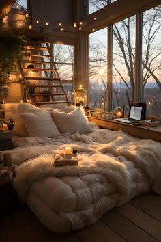 a large bed sitting in front of a window next to a stair case filled with books