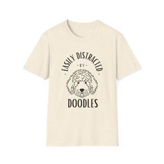 This cute and funny doodle t-shirt is perfect for those who love Doodles. Made from 100% ring-spun cotton, this lightweight and comfortable tee is suitable for wearing all year round. The classic fit and crew neckline make it versatile for any occasion, formal or semi-formal. Ideal for dog lovers and those who appreciate whimsical designs, this t-shirt is a great addition to your wardrobe. Perfect for casual events, dog-themed parties, and everyday wear. Product features - Made from 100% ring-spun cotton for durability and smooth fabric - Classic fit with crew neckline for versatile style - Ethically grown and harvested US cotton for sustainability - Various fabric blends for different color options - Pearlized, tear-away label for total wearing comfort Care instructions - Do not dryclean Dog Themed Parties, Love Doodles, Doodle Dog, Funny Doodles, Dog T Shirt, Dog Themed, Dog Tshirt, Semi Formal, Crew Neckline