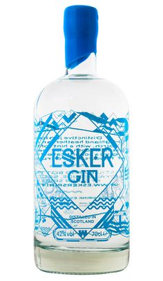 a bottle of water that is sitting on a white surface with a blue cap and the words fisker gin written in it