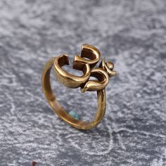 "Om Ring, Brass Ring, Ohm Ring, Designer Brass Ring, Vintage Ring, Dainty Ring, Handmade Ring, Meditation Ring, Religious Ring, Yoga Ring Size:- All Size Available In Variation Metal:- Brass IMPORTANT NOTE....👇 1 product free gift on purchase of 3 products. You can choose the free gift as your wish. Take a screenshot of the free gift you like from my shop and send me a photo in personal message. MUST READ....👇 5 stars is my shop's priority. So contact me before leaving any negative review. I a God Ring For Women, Om Finger Ring Gold, Om Ring Design For Women, Men's Rings Gold Indian, Ohm Ring, God Jewelry, Simple Ring Design, Black Metal Jewelry