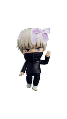 an action figure with a pink bow on it's head and black clothes,