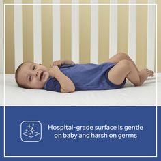 a baby laying on its back in a crib with the caption hospital - grade surface is gentle on baby and harsh on germs