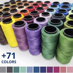 spools of thread in different colors and sizes