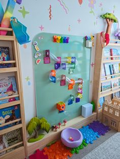 a child's playroom with toys and books on the shelves, including a book shelf