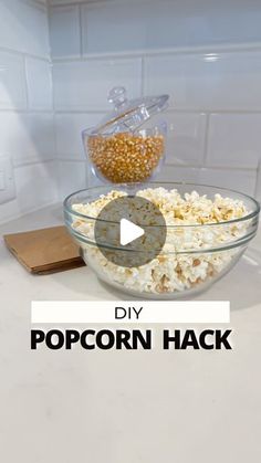 a bowl filled with popcorn sitting on top of a counter