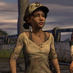 the walking dead game character is standing next to another person