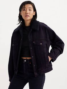 14.6 ounce Our '90s Sherpa Trucker Jacket makes an outfit. You'd be hard-pressed to find a jacket with an easier shape, more versatile weight or inherent sense of cool. Bonus: This throwback cut features a pitched silhouette for a distinctly ‘90s feel and is lined with ultra cozy sherpa. An homage to our iconic Levi’s® Trucker Jacket Constructed with a unique pitched '90s profile and two-flap pocket design A blank canvas for self-expression that can be passed down for generations Lined with sher Black Levi Jacket Outfit, Jean Sherpa Jacket Outfit, Levi Jean Jacket Outfits, Black Sherpa Jacket Outfit, Levis Jacket Outfit, Sherpa Jacket Outfit, Black Sherpa Jacket, Levi Jean Jacket, Black Levi Jeans