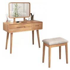 a wooden vanity table with a mirror and stool