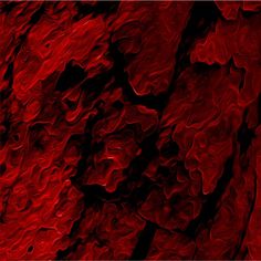 an abstract red background with black spots