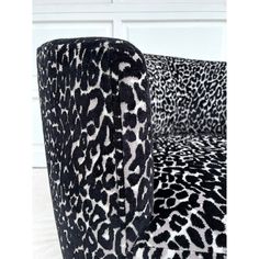 a black and white leopard print chair